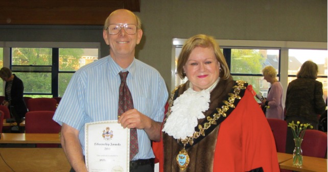 Philip Knighton being presented with his Good Citizenship certificate by Taunton Mayor Libby Lisgo